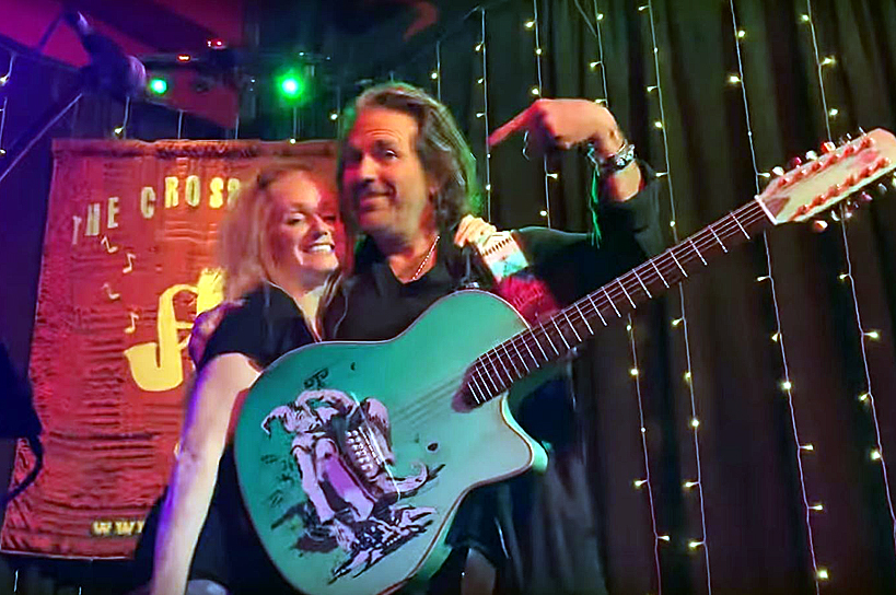 Watch local cover band artist sing duet with Kip Winger